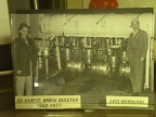 Two long term Stevens Point Brewery workers in front of the keg racking machine.